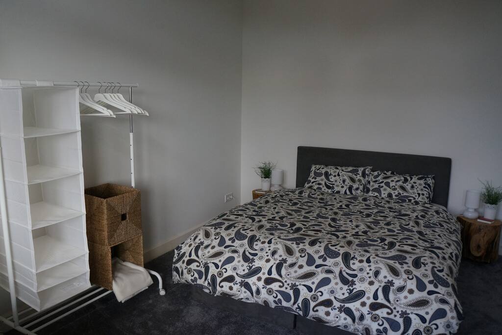 Doublebed and clothes rack