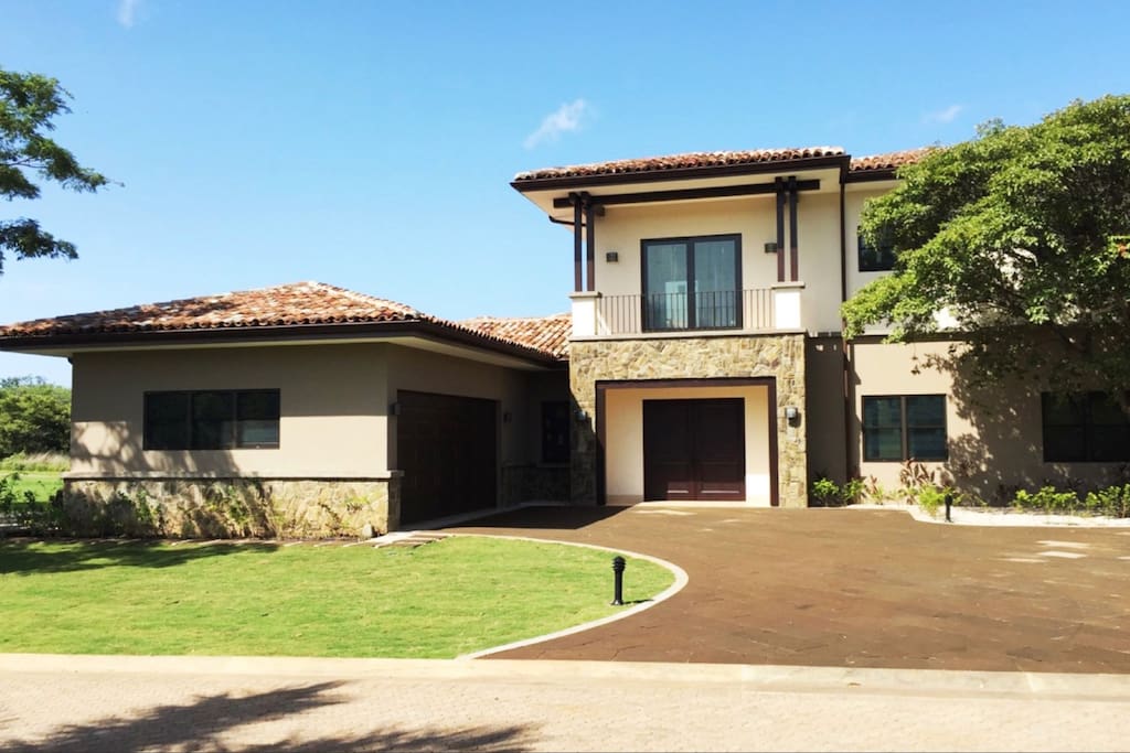 Spacious entrance with garage and outside parking