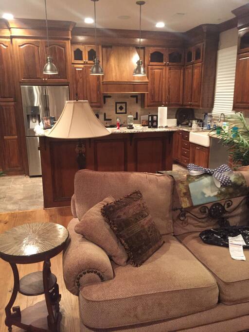 Living room and Kitchen with speakers and 5.1 Surround Sound.