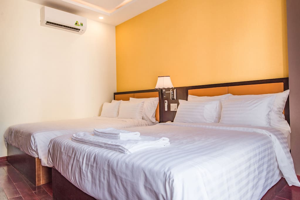 Deluxe Quaduple room, 2 double beds, with balcony, Price from 600.000vnd/night