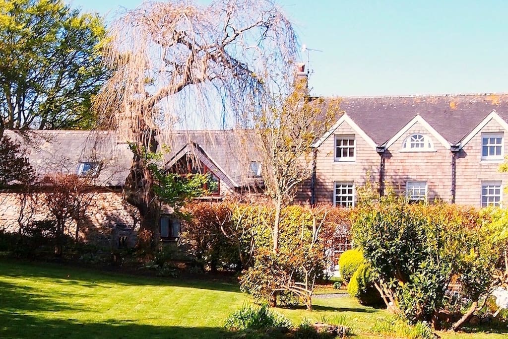 A view of the Rectory and Cottage from the 1 acre Garden