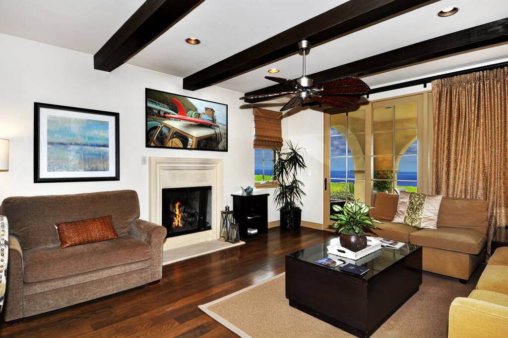 Spacious Living Room with Fireplace, HDTV, Twin Sleeper... all opens to Enlarged Patio