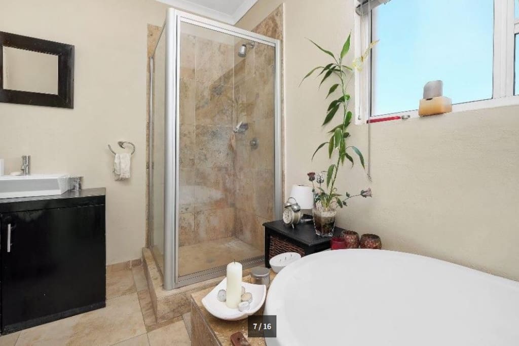 Full Bathroom with huge bath and full shower