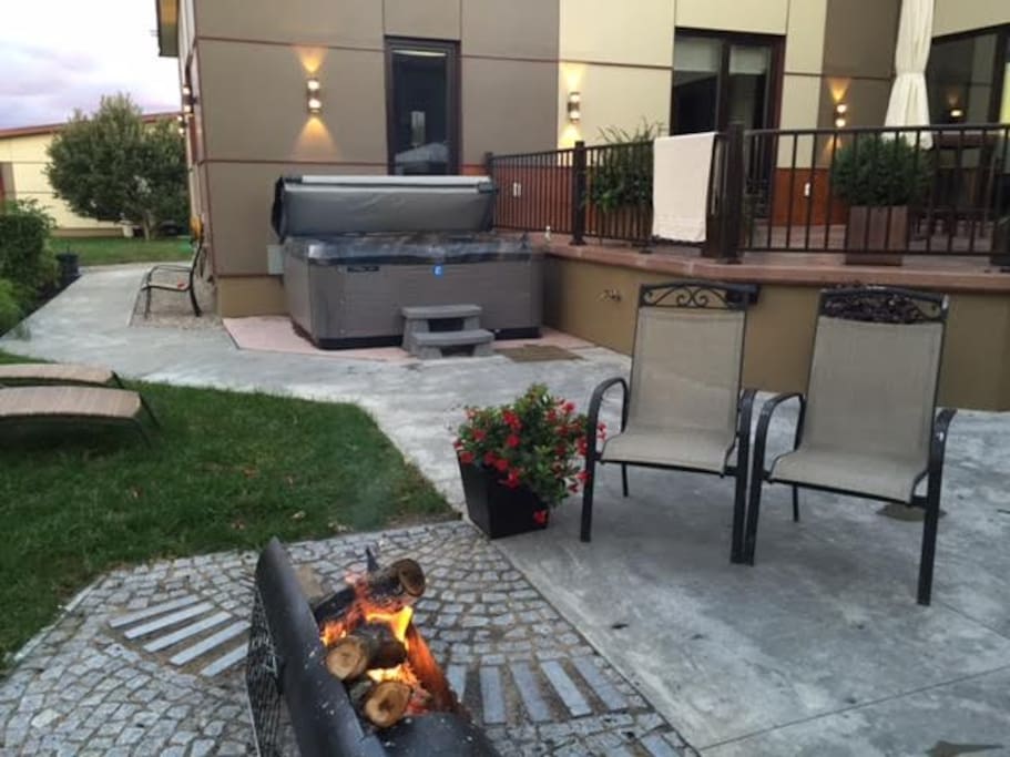 Back yard with a hot tub