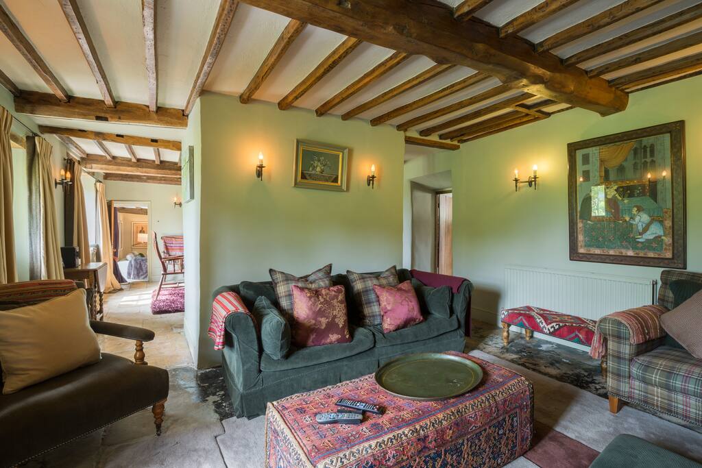 The traditional old beamed 17 c lounge...
