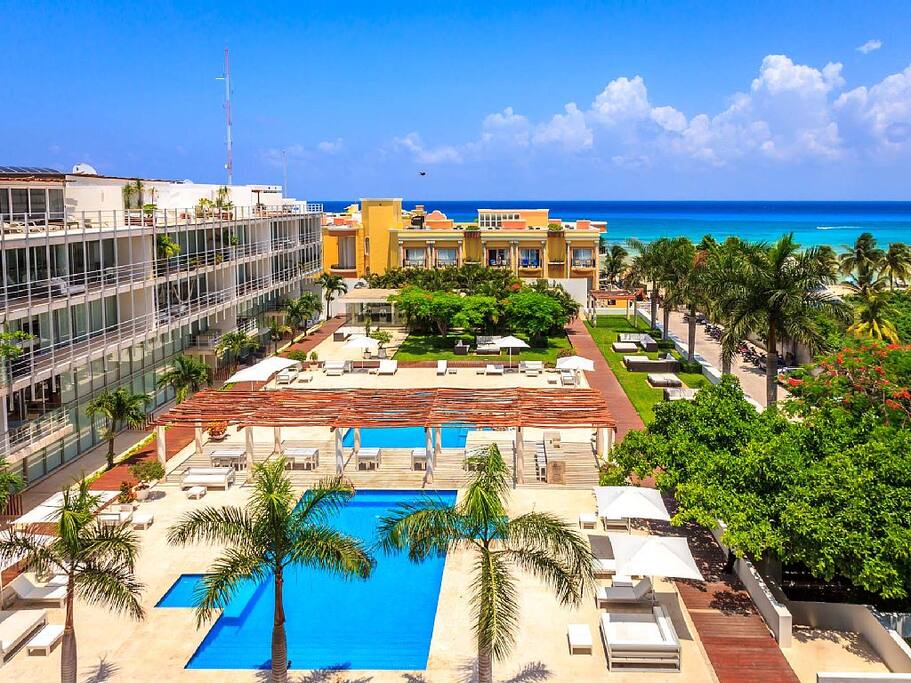 Building,Hotel,Resort,Palm Tree,Tree