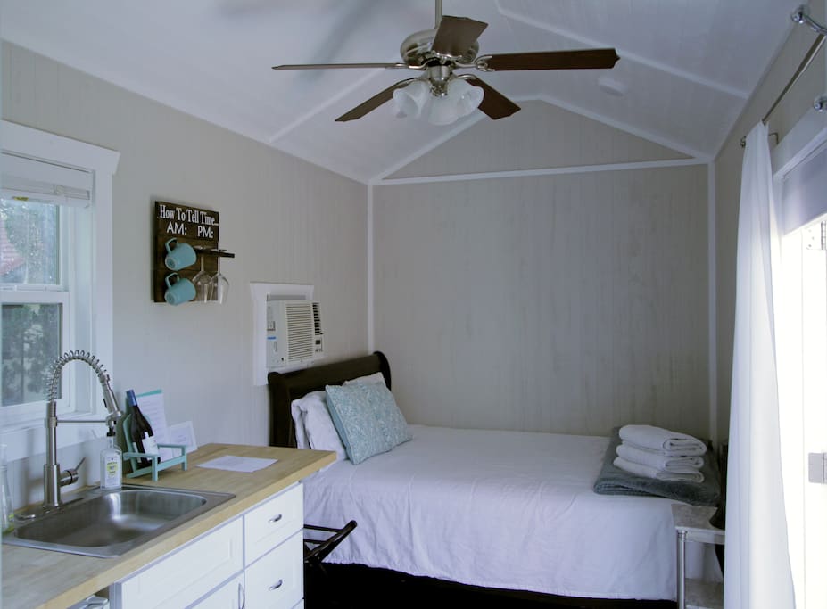 Most tiny houses feature lofts, but we have a Queen size bed on the ground level.