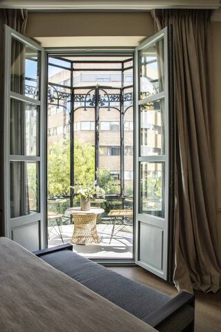 Luxury apartment with balcony in master bedroom gallery image 5