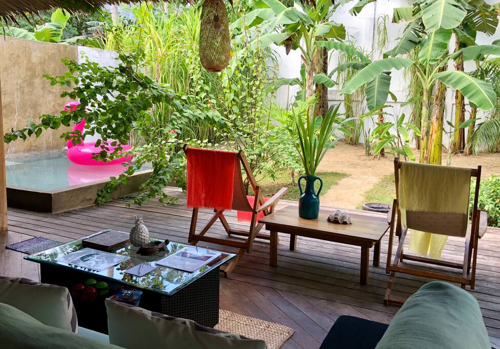 Living room, pool and garden