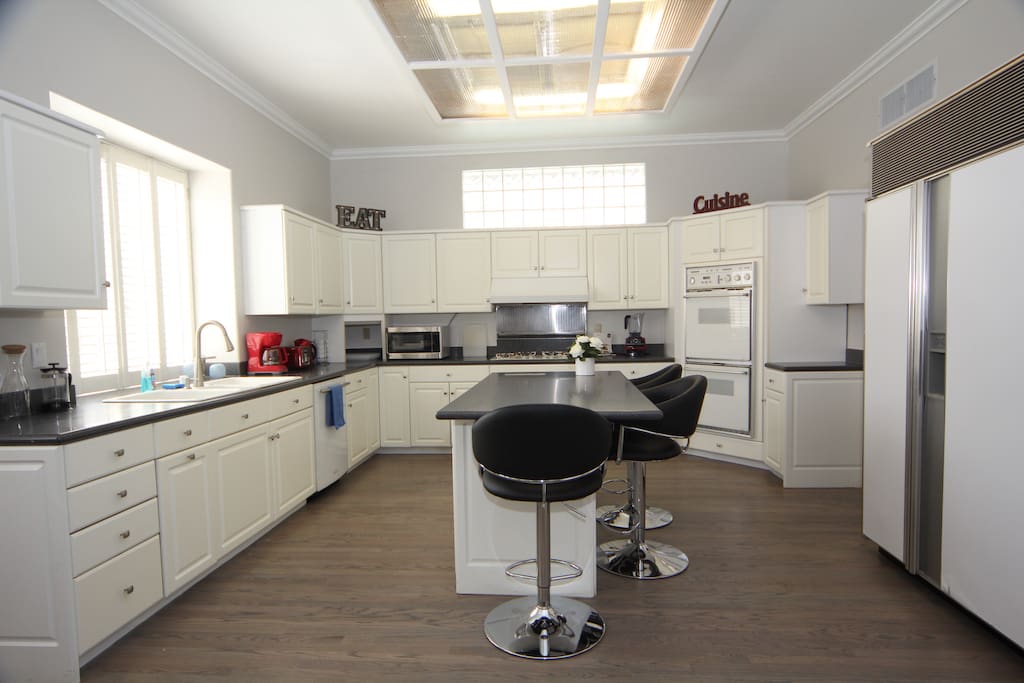 Oversized Kitchen. Thermador (classic) appliances. Cookware, Dishware and Misc Cooking Spices included. Center Island & Bar Stools