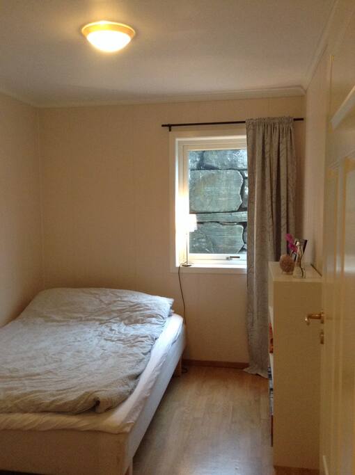 Your room. The bed is 180 x 220 cm and is spacious enough for 2 people.