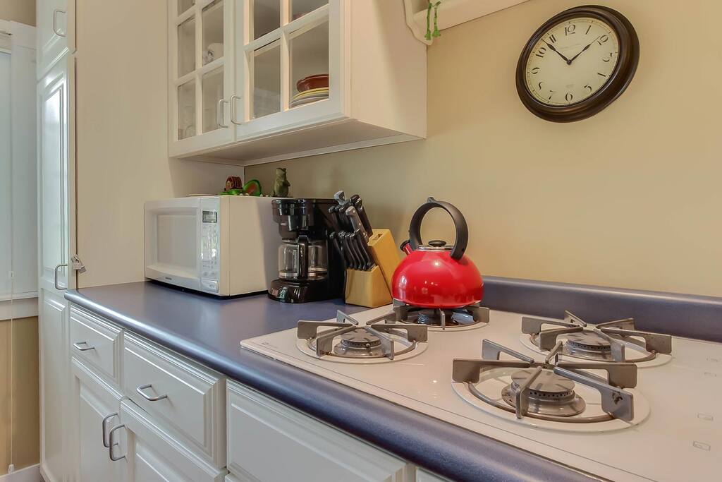 The kitchen has a gas range, but no oven.