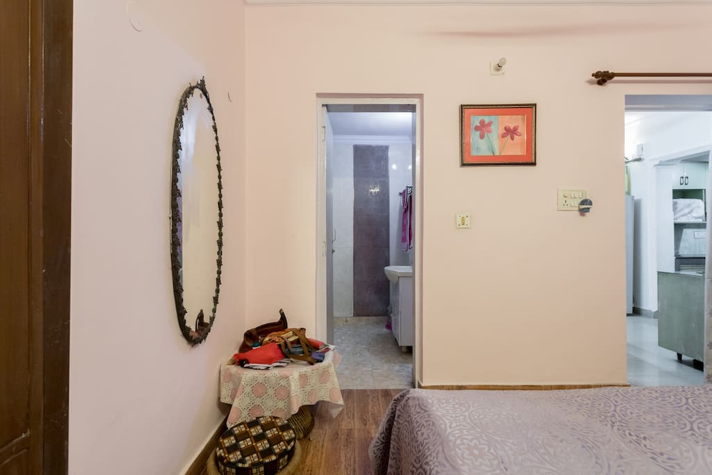 Bedroom ..showing mirror n door to washroom