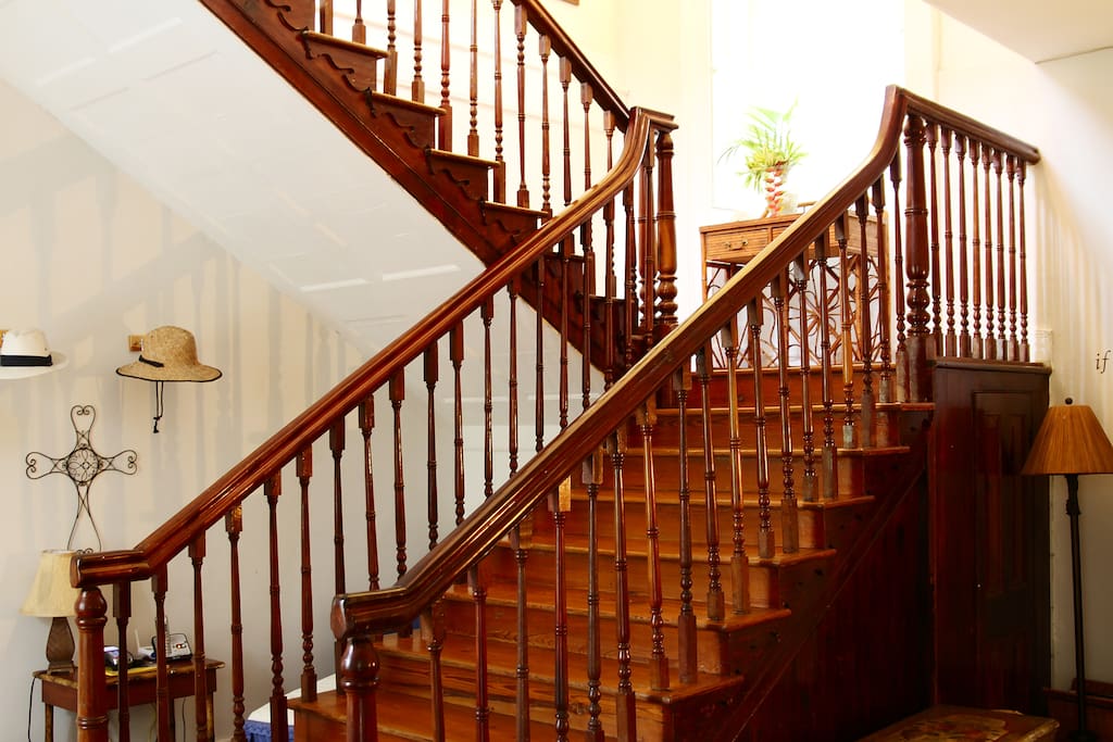 Gorgeous mahogany staircase leading up to The Island Room