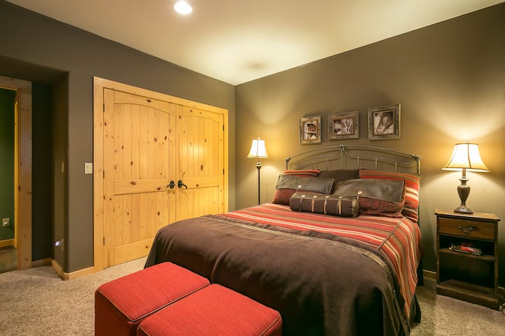 Large queen bedroom in basement