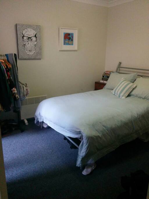 Double bed with door onto private courtyard.