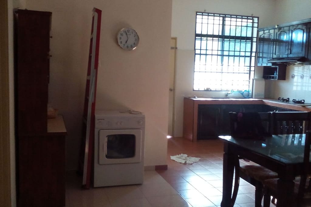 Kitchen come with washing machine, dryer, cooking place & dining table