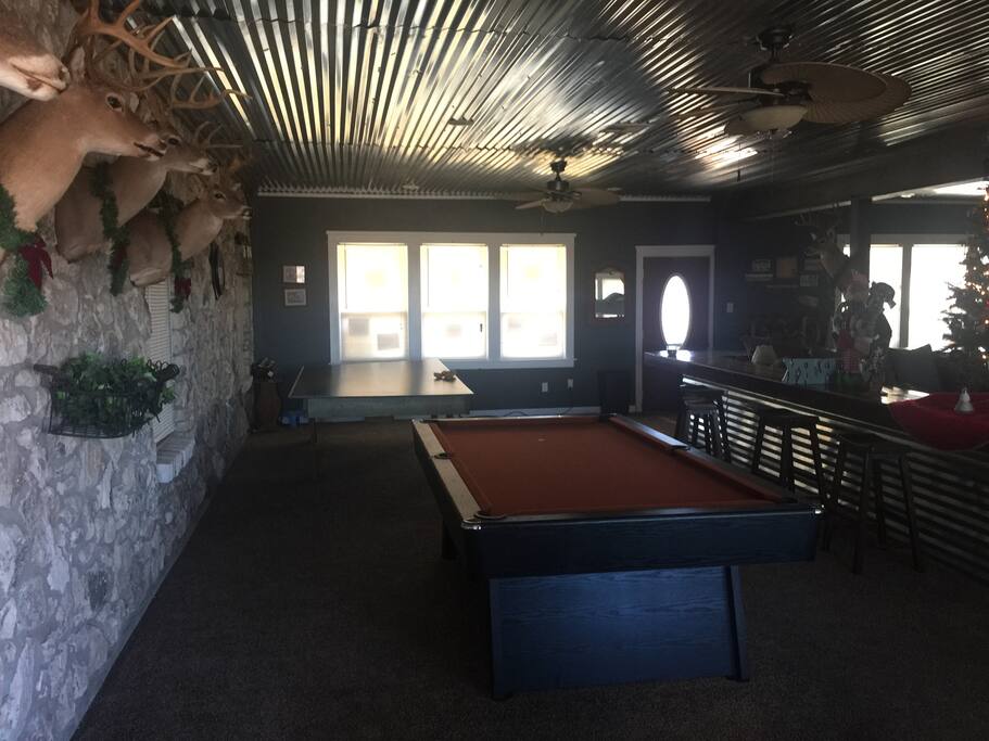 Game room pool table,ping pong, bar area,