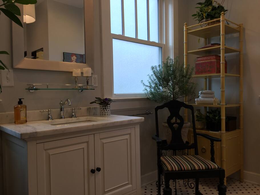 Nice sink and plenty of light in the bathroom