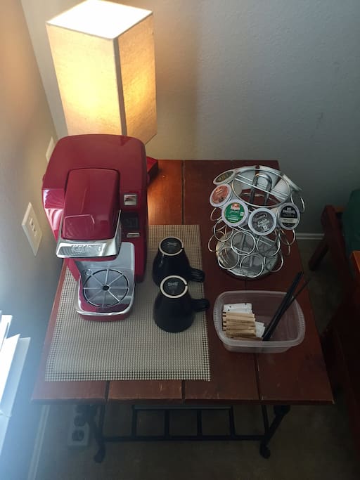 Your own Keurig in the room with a variety of K-Cups (coffee, tea, and hot chocolate), creamer and sugar.