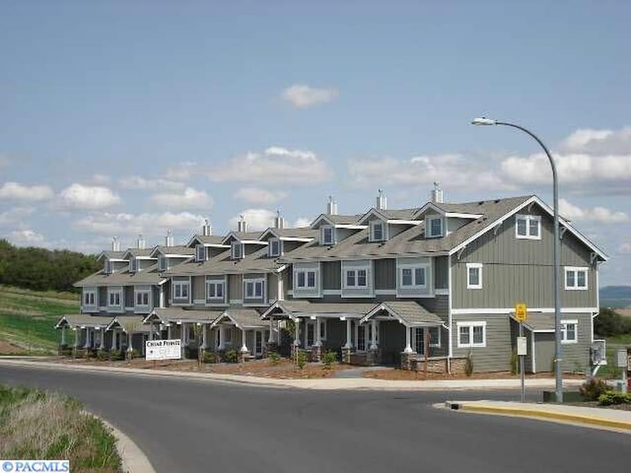 Condos are in a quiet area on top of a hill surrounded by nature