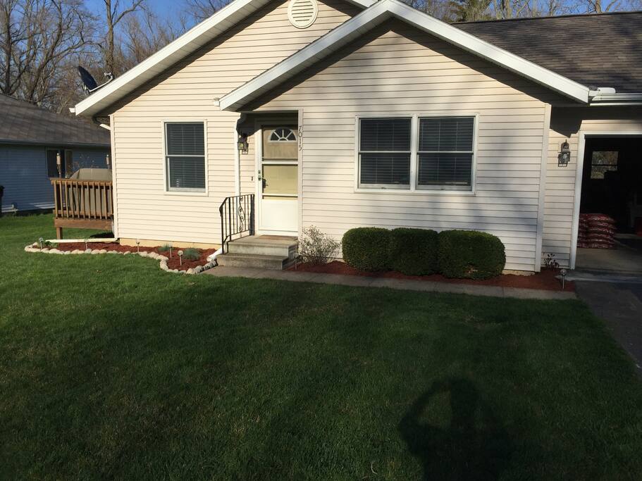 Newly remodeled cottage steps to Paw Paw Lake and public boat launch