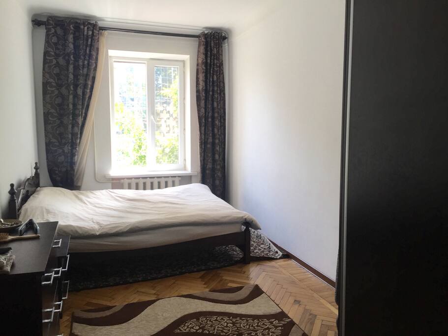 Bedroom with queen size bed.