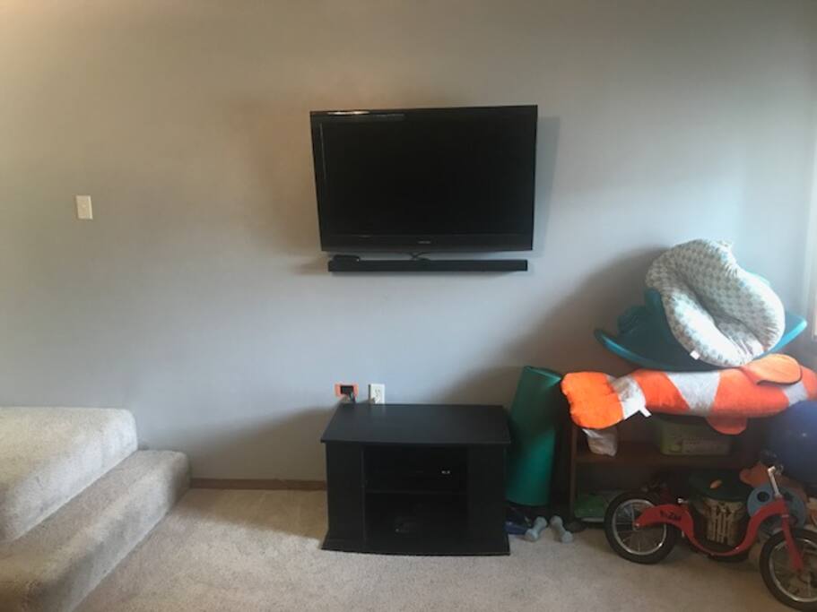 Entertainment system with TV, Roku, BluRay player. Toys for kids too!
