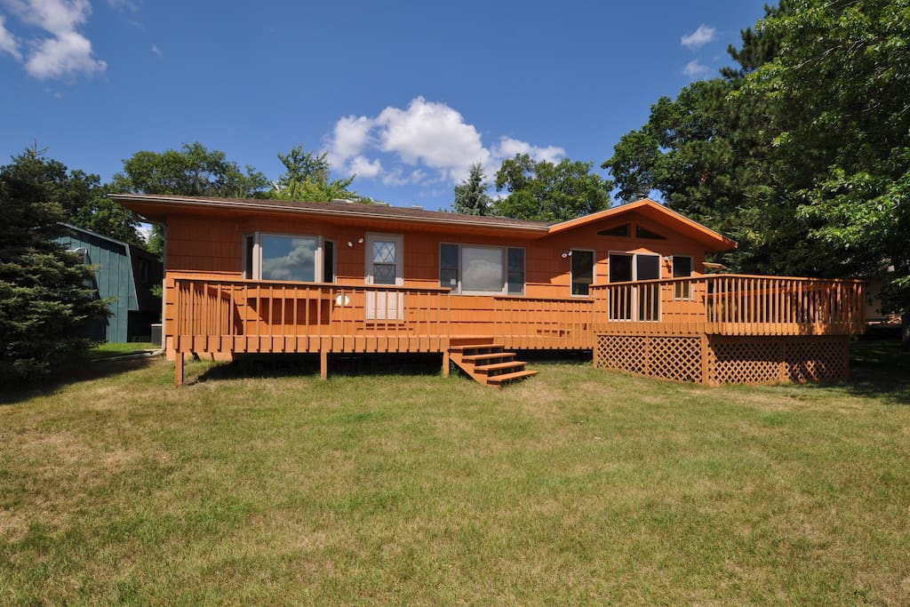 The home boasts a spacious deck facing the lake.