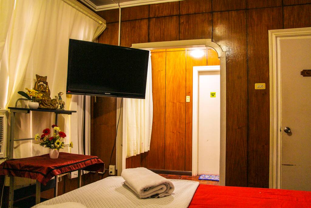 Master BR with 40 inch TV, AC and adjacent washroom with heated shower..
