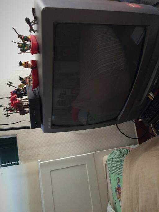 TV with small Lego (next to bed)