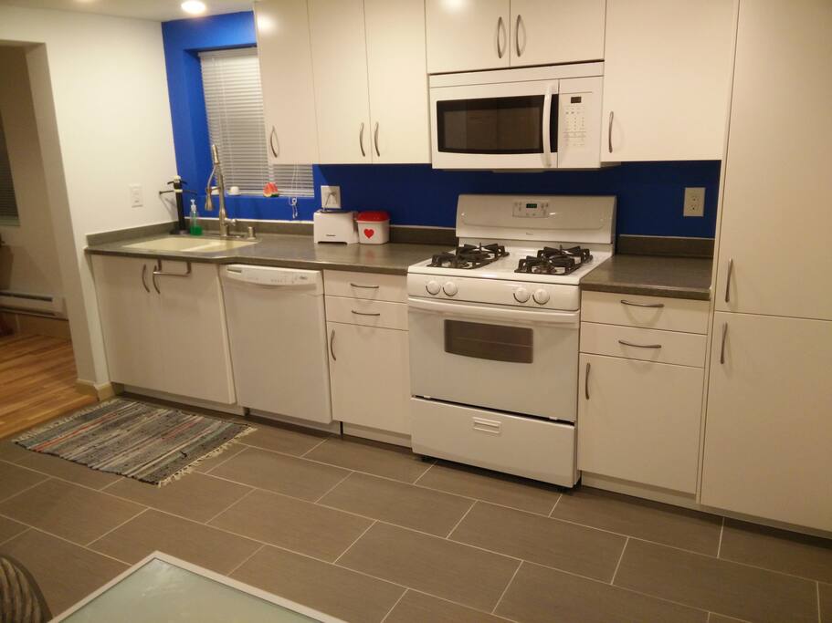 Kitchen, fully stocked for cooking and baking.