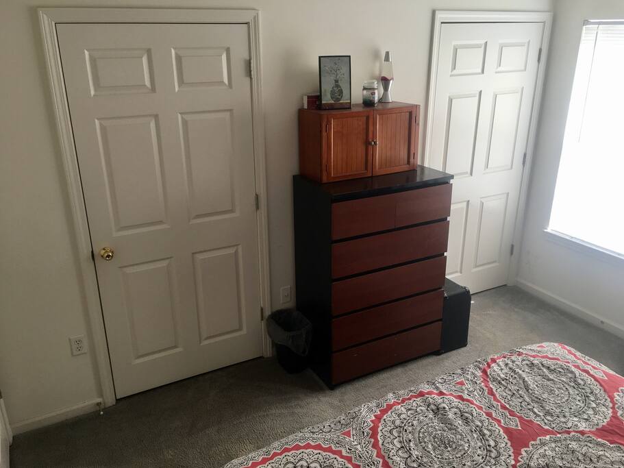 Dresser will a drawer for your clothes. Left door is private bathroom. Right now is closet (guests have no access to it)