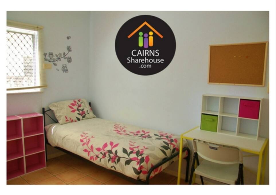 Comfortable single bed with a desk