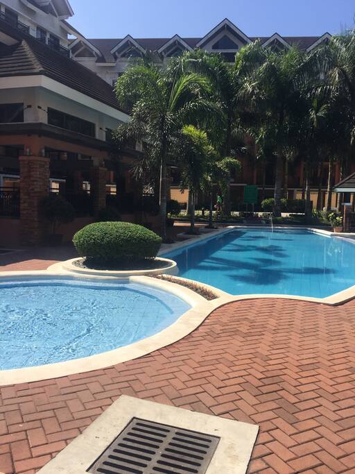 Swimming pool adult and kiddie pool with Mini Playground besides the pool,