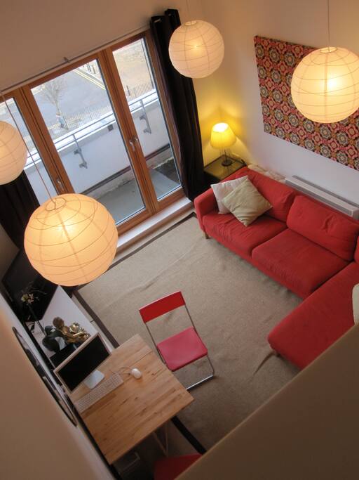 bedroom overlooks double height living space