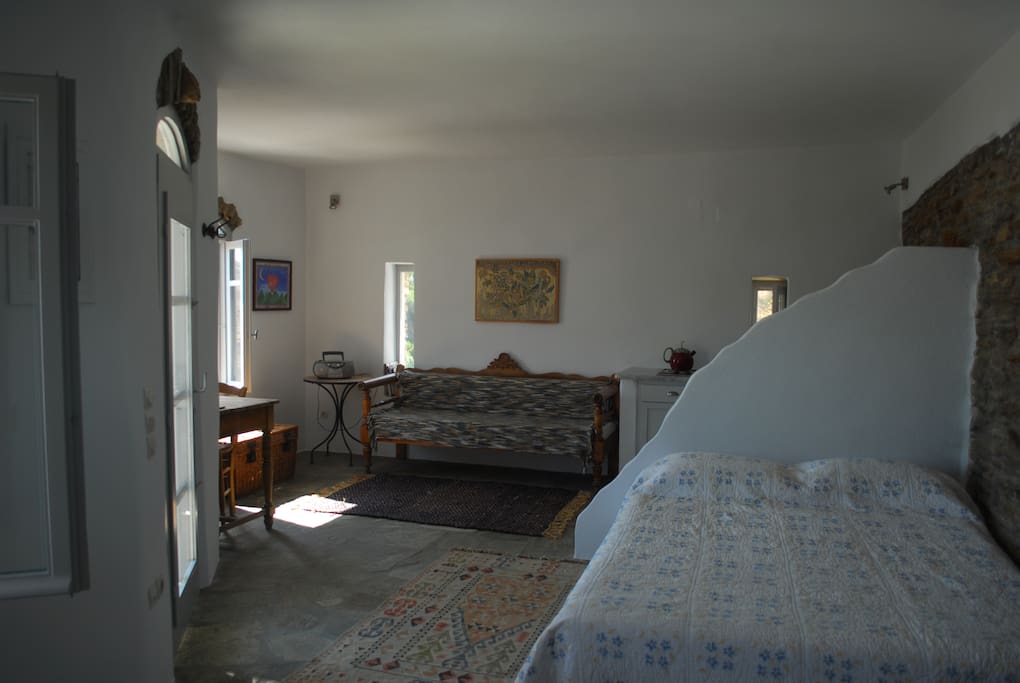 Double bed, dining living area