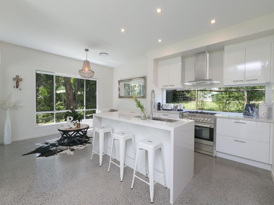 Modern kitchen with plenty of natural light and views in every direction