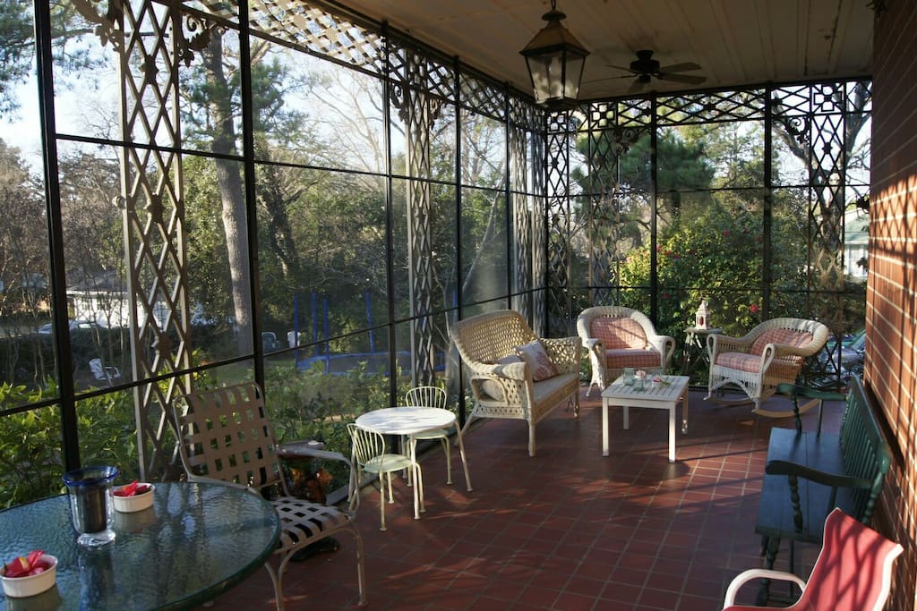 Screen porch is cozy for drinks and a good conversation.