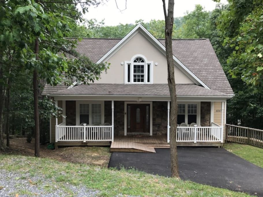 Front porch with seating to enjoy the fresh mountain air.