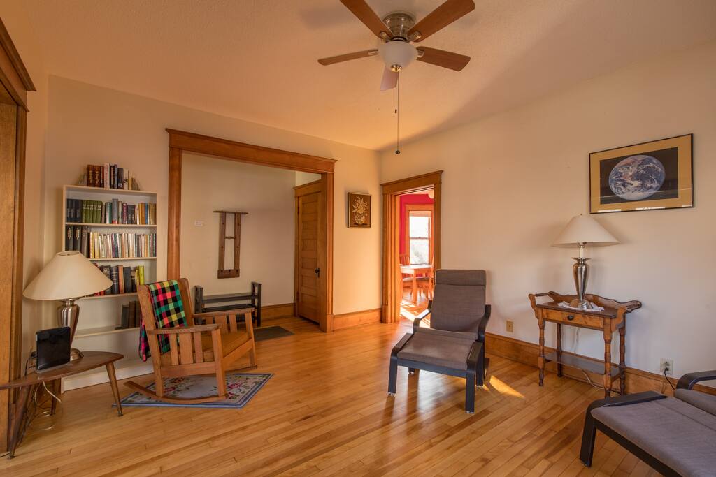Living room and front entry. Coat closet behind the door.