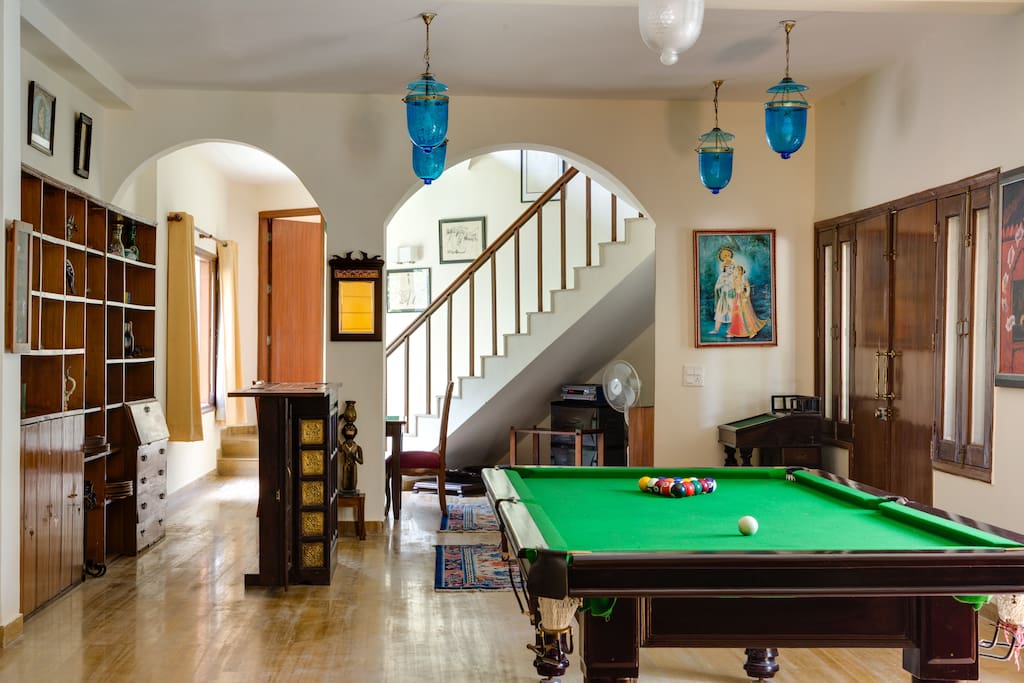 Living Room with mini library and pool table
