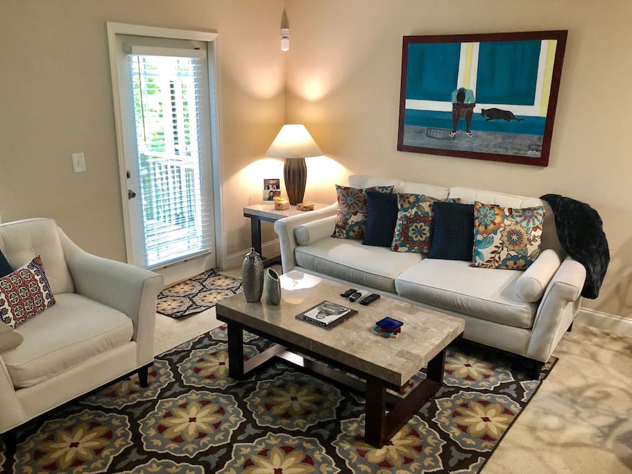Living room with access to private deck