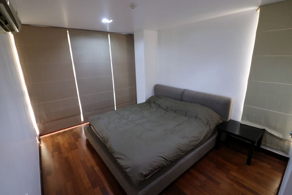 1st Master Bedroom, very large with many windows and blinds that come down
