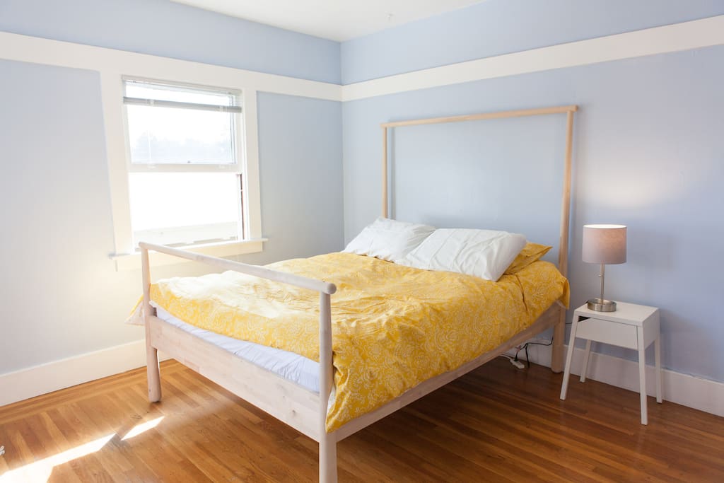 The blue bedroom with queen size Yogabed memory foam mattress
