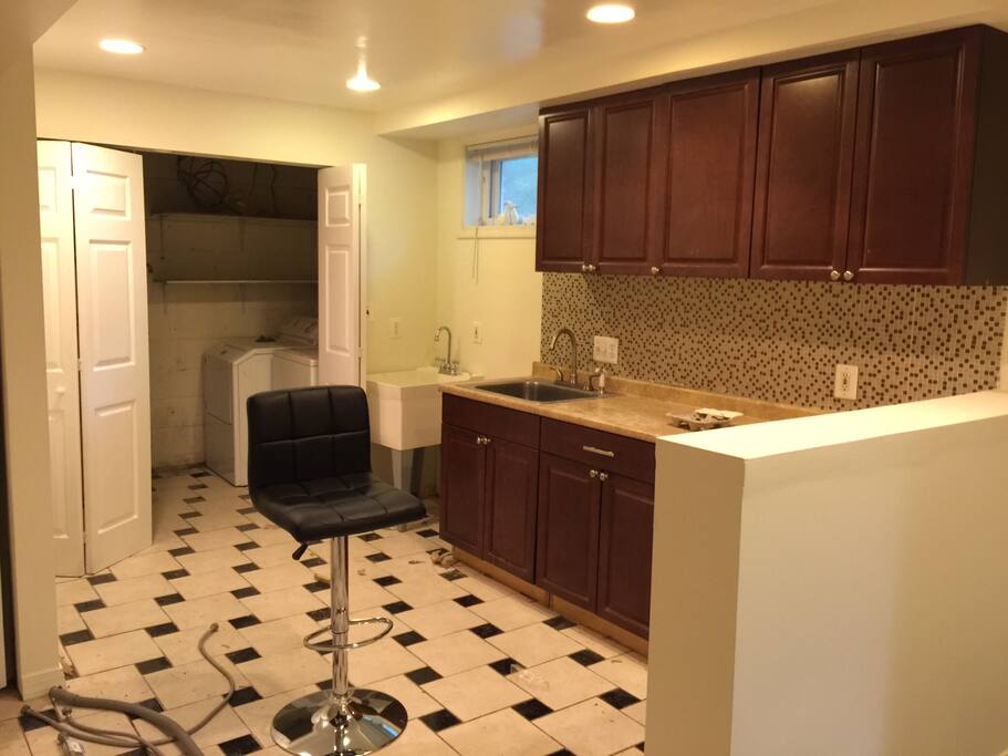 Mini bar with toaster, coffee maker, microwave.