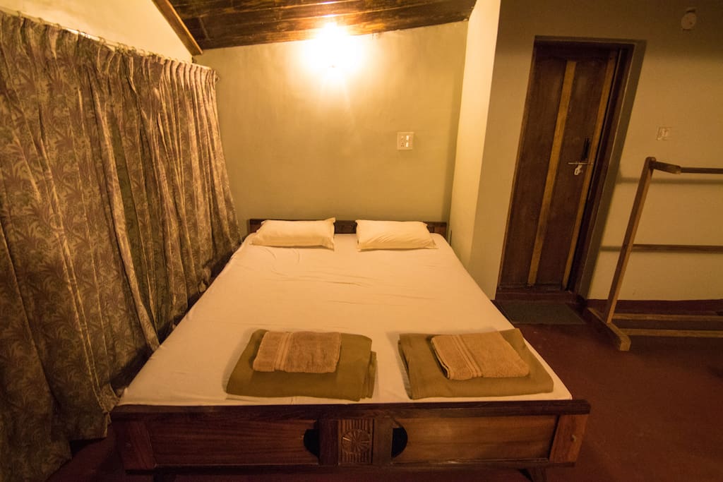 The bedrooms are equipped with large cozy beds
