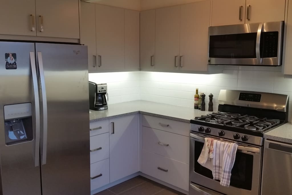 Brand new custom Kitchen including gas range