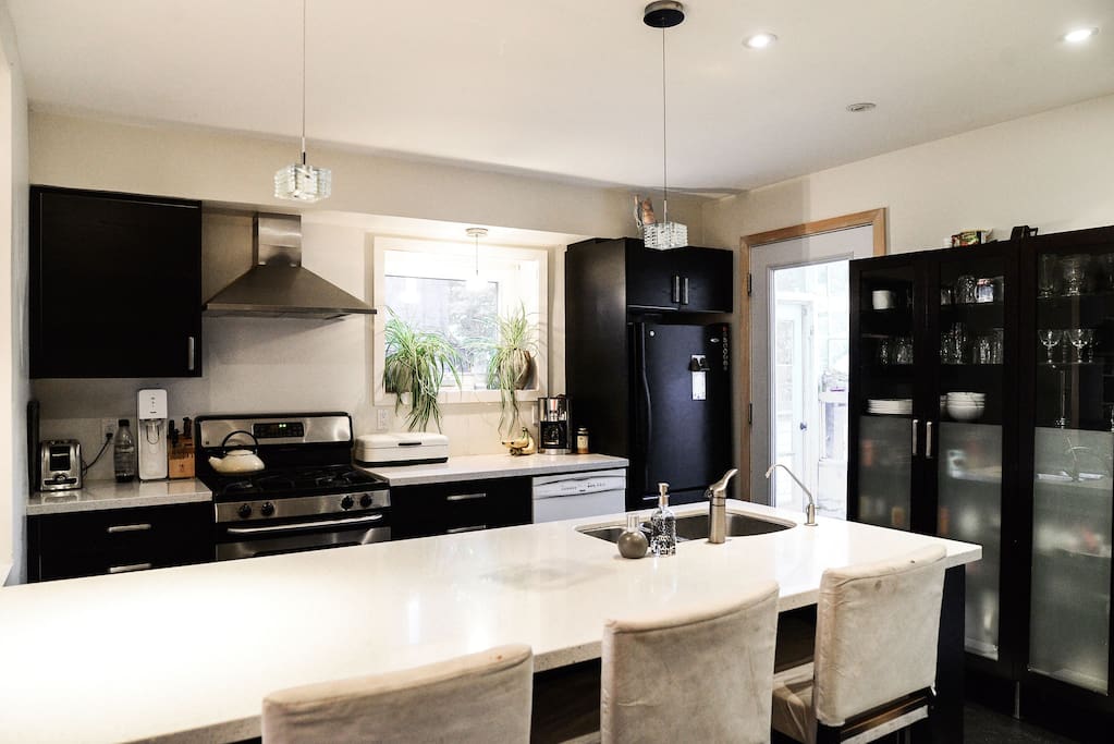 Open concept kitchen with everything you need to for a great meal (including takeout menus)
