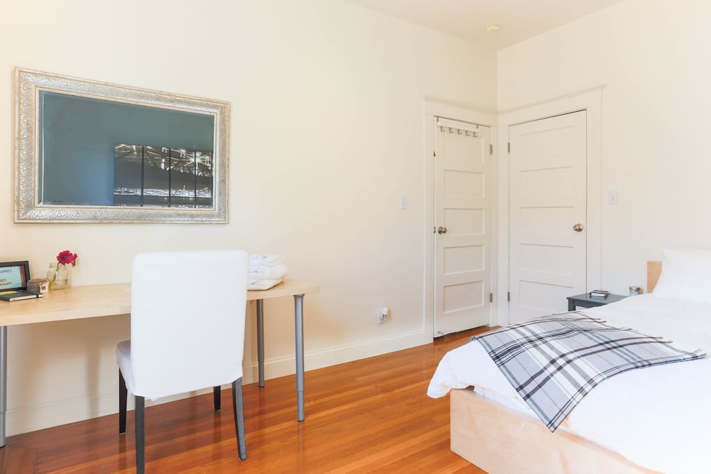 Bedroom with a desk for working space.